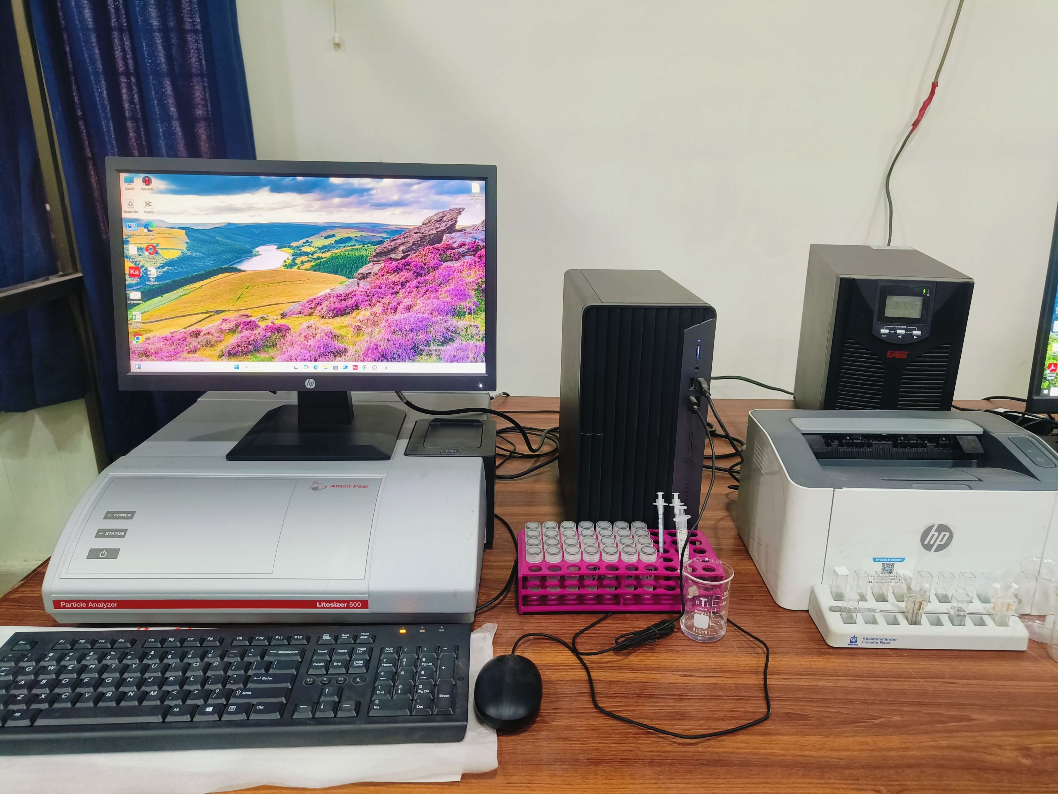 Virtual reality headset and controllers set up on a lab desk